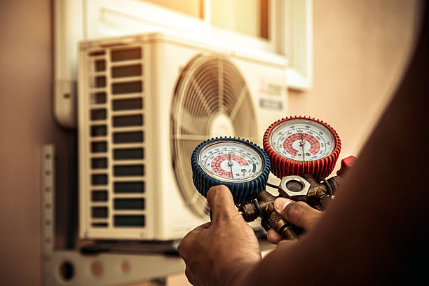Professional Air Conditioning Service technician working in Holtwood, PA